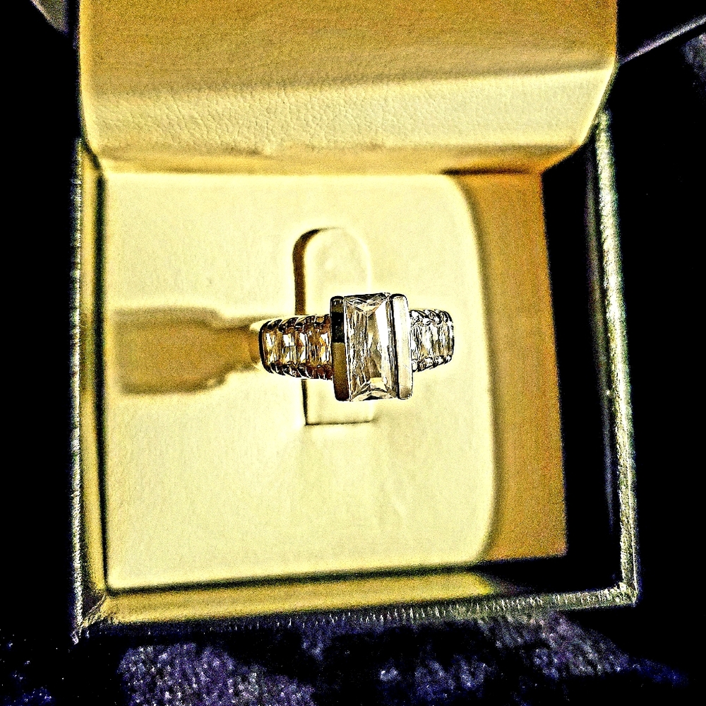 Sterling silver ring with several cz stones